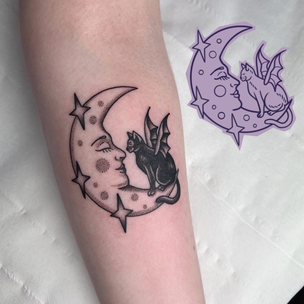 One of Gem Hawk's flash designs next to the finished tattoo, a crescent moon with a winged cat