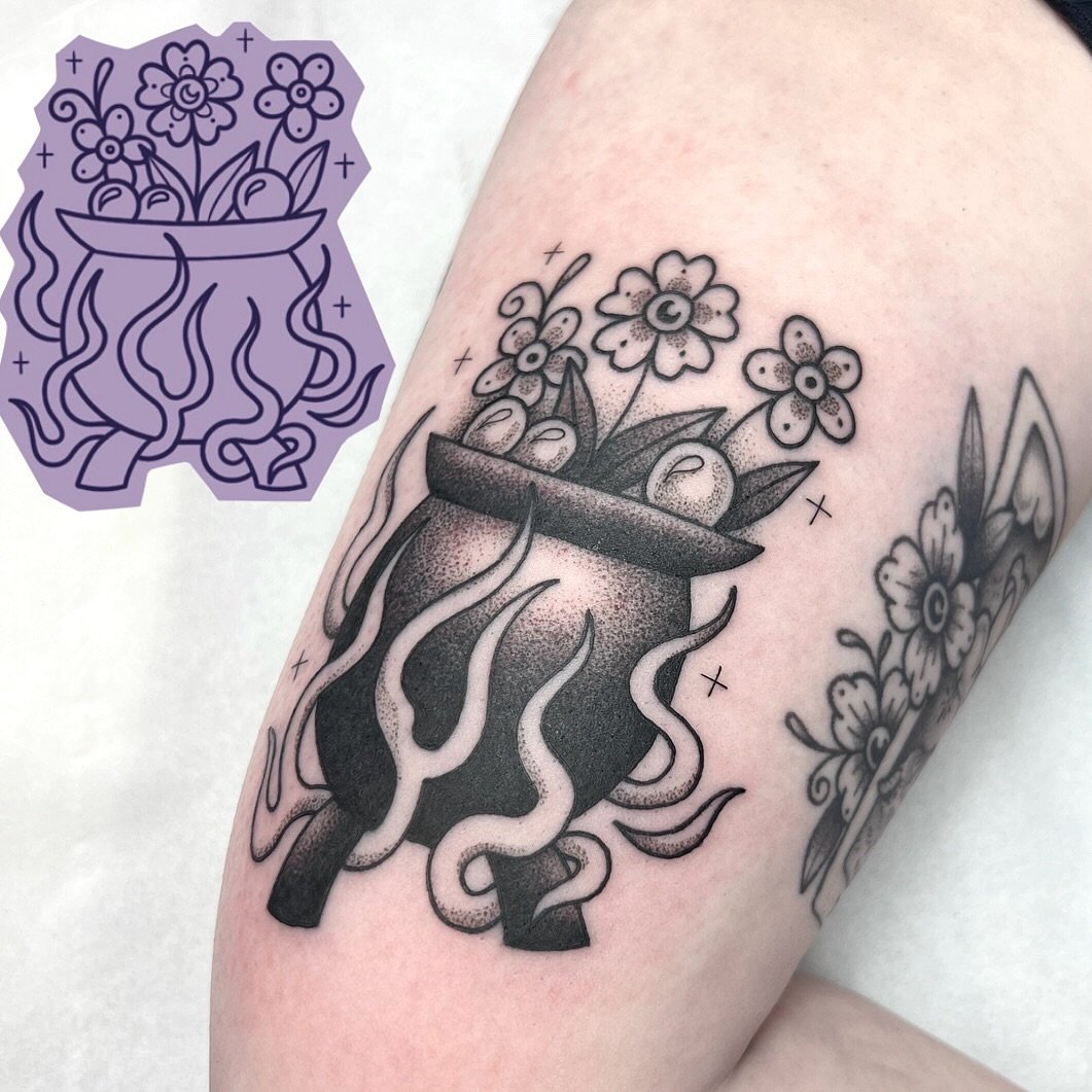 One of Gem Hawk's flash designs next to the finished tattoo, a cauldron of flowers