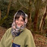 Minnie, tattoo artist from Manchester, in a woodland